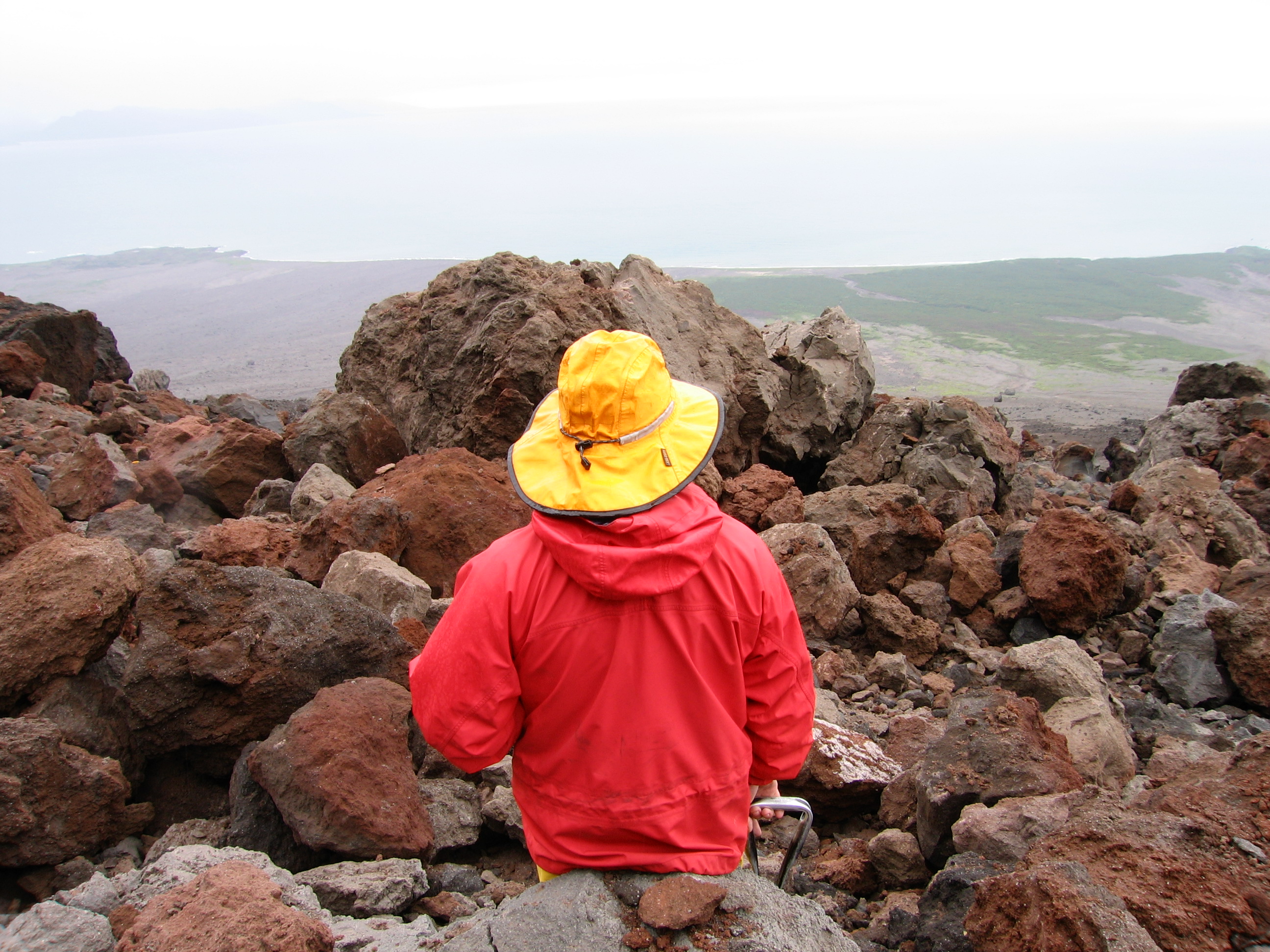 Jim Beget sits at the toe of the northeast lava flow.