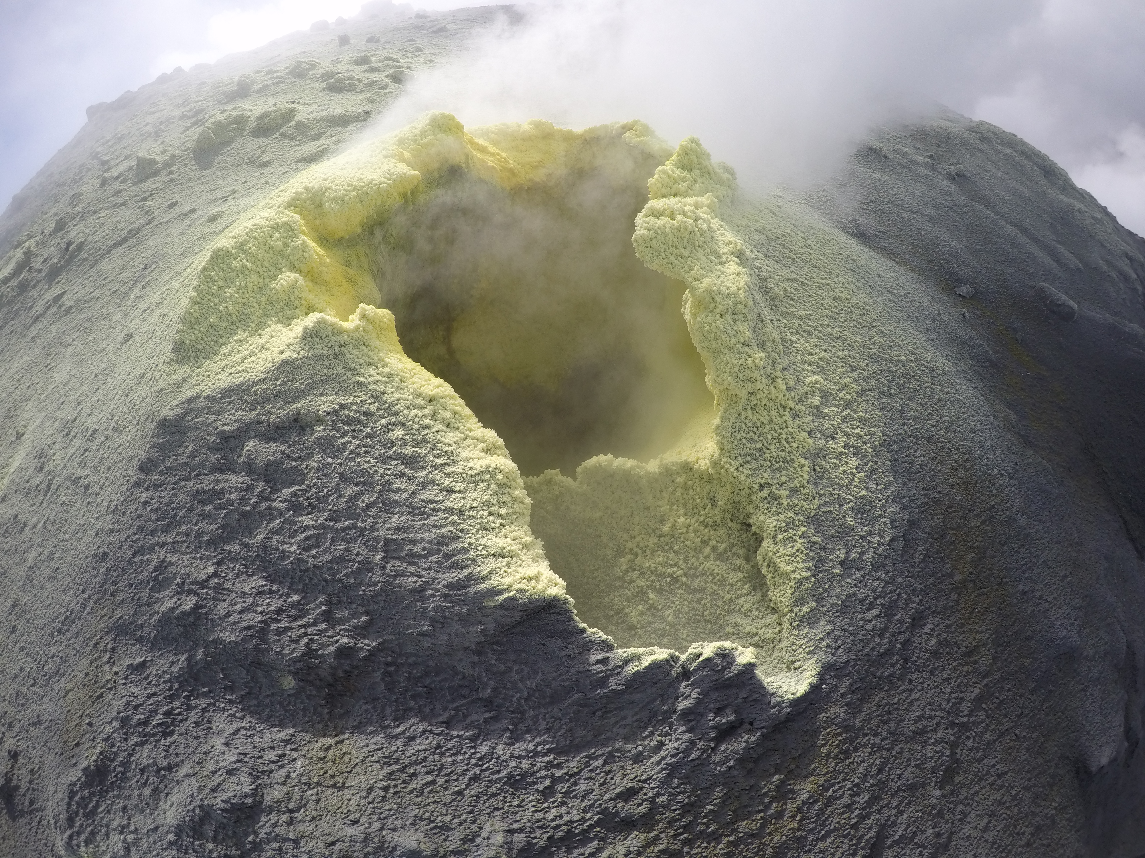 Active Fumaroles And Yellow Sulfur Deposits Around The Summit Crater At ...