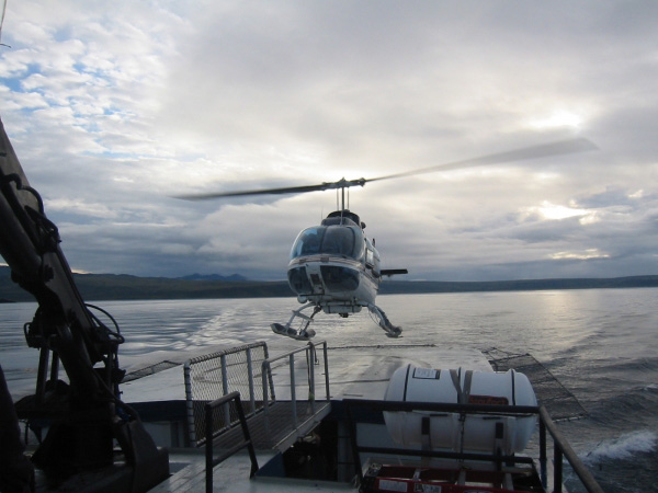 Helicopter landing on the back of the Maritime Maid after a day of field work.