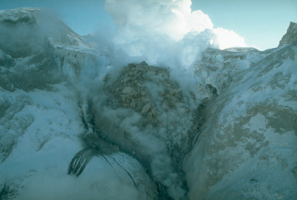 The 1989 to 1990 eruptions of Redoubt Volcano were 
characterized by repeated growth and destruction of lava 
domes in the summit crater. This view shows the north face 
of the second largest lava dome, which was destroyed during 
an explosive eruption on February 15, 1990. Photograph by 
R. McGimsey, U.S. Geological Survey, February 2, 1990.