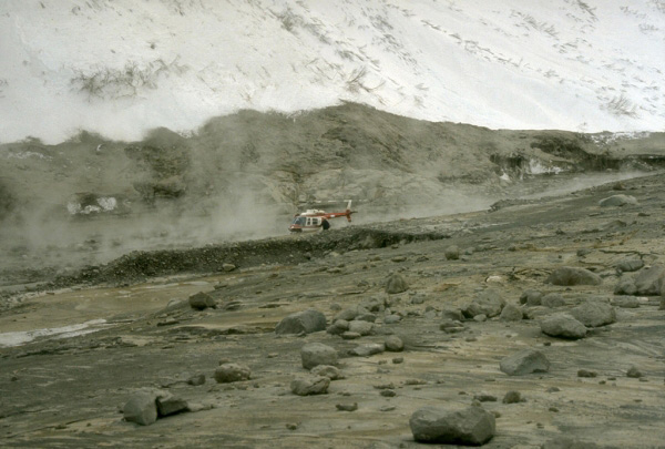 Hot debris avalanching down the steep north flank of 
Redoubt Volcano during the 1989 to 1990 eruptions mixed 
with water derived from melted snow and ice to form lahars. 
These sediment-rich floods carried steaming debris as far 
as 35 km (22 mi) down the Drift River valley. Photograph by 
T. Miller, U.S. Geological Survey, February 15, 1990.
