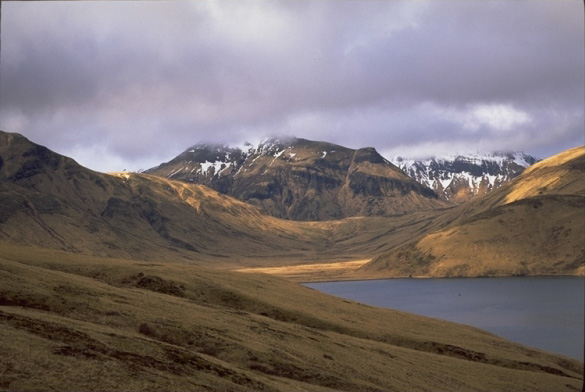 Head of Akutan Harbor, and location of hypocenters for the March, 1996 seismic swarm at Akutan.  The low saddle separates the harbor from Hot Springs Bay.