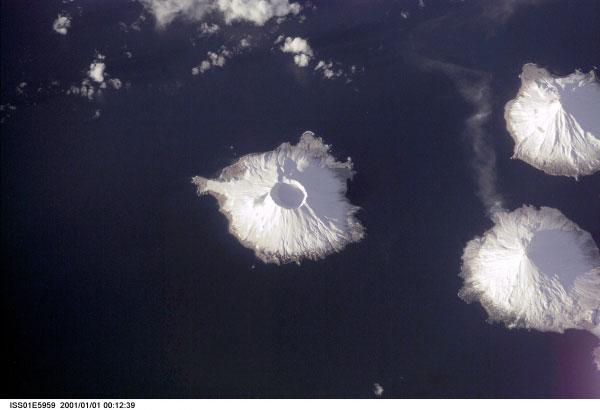 Herbert Volcano in center of image, Mount Cleveland in lower right, Carlisle Volcano in  upper right of image.

Mission: ISS001 Roll: E Frame: 5959 Mission ID on the Film or image: ISS01
Country or Geographic Name: USA-ALASKA
Features: HERBERT ISLAND, CRATER
Center Point Latitude: 52.5 Center Point Longitude: -170.0