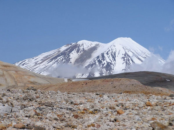 Mount Griggs stratovolcano, Valley of Ten Thousand Smokes, as seen from near Novarupta Dome. At 7,650 ft (2,330 m) ASL, Mount Griggs is the highest peak in Katmai National Park and Preserve. It lies 12 km behind the main volcanic front, and its summit is home to superheated sulfur-precipitating fumaroles.