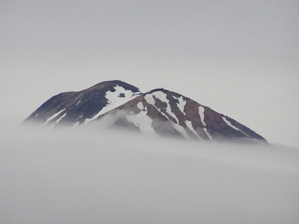 Zoomed in photo of the southern part of the summit of Mt. Carlisle volcano (northwest of Mt. Cleveland) as seen from the 2003 campsite on Mt. Cleveland. The photo was taken as the weather began to deteriorate.