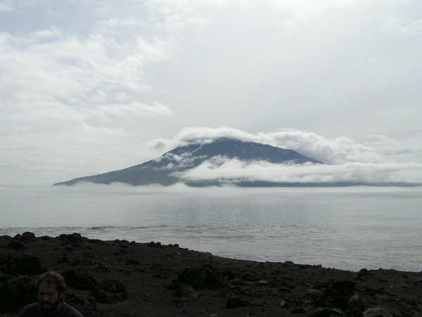 Photo of the best view of Mt. Herbert volcano as observed from the 2003 campsite on the volcaniclastic debris flow fan deposit created from the 2001 Mt. Cleveland eruption. The volcano was usually obscured by clouds during the 2003 fieldwork.
