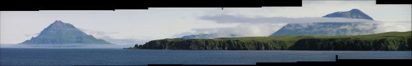 Panoramic photo of Uliaga Volcano (left) and Kagamil Volcano (right) as viewed from the western side of Applegate Cove on the northeastern flank of Mt. Cleveland.