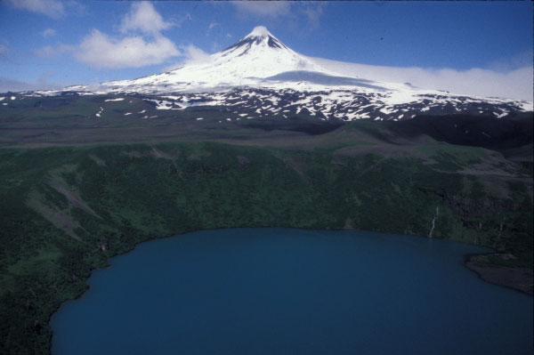 Scenic Shishaldin volcano, with a large maar in the foreground.