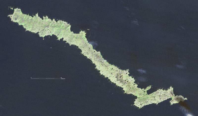 True color composite (RGB of bands 3-2-1 respectively) Landsat 7 ETM+ satellite image of Amchitka Island in the Western Aleutian Islands of Alaska. The image was run through a 3x3 high pass filter and fused with the 15 meter panchromatic band data to produce a spatial resolution of 15 meters. North is up in the image.
