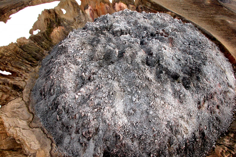 Novarupta Dome, an almost perfectly circular mass of rhyolite lava, was emplaced at the Novarupta vent site in the weeks to months following the explosive eruption of June 6-9, 1912. The dome is roughly 500 m across and sits in the nearly 2-km-wide vent crater. The rubbly texture is characteristic of silicic lava domes. 