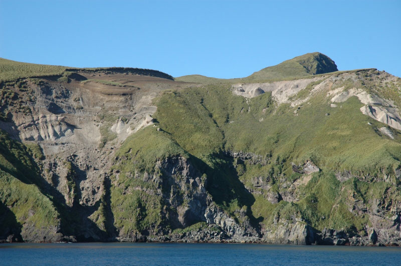 Davidof Volcano southern coastline, exposed pyroclastic deposits. 