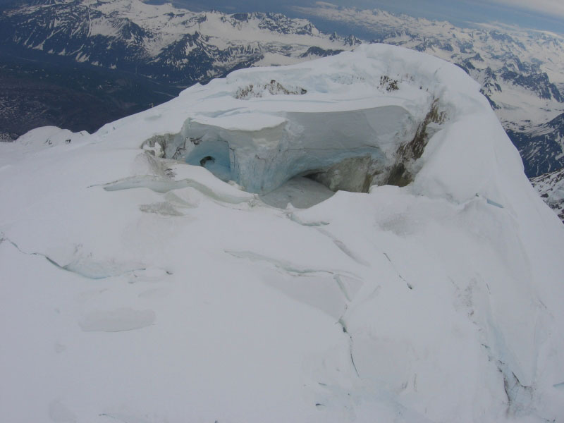Tephra layers exposed in snow stratigraphy in the 2005 Spurr melt pit wall.