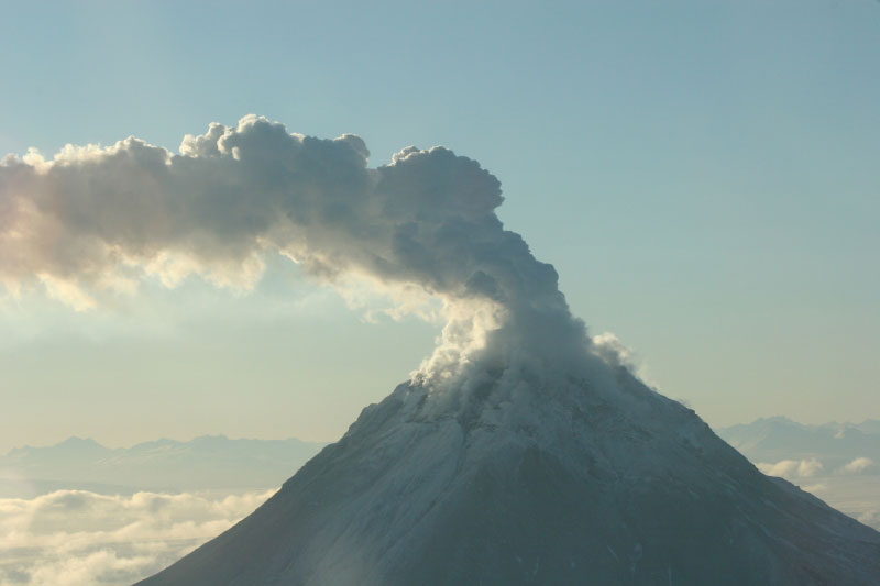 Summmit area of Augustine Volcano on January 24, 2006.  Photo of upper east flank of volcano; steam and gas plume going to S SE.
