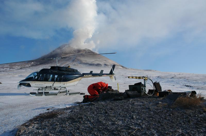 Tim Plucinski installs a new short-period seismic station, AUNW, on Augustine's northwest flank.