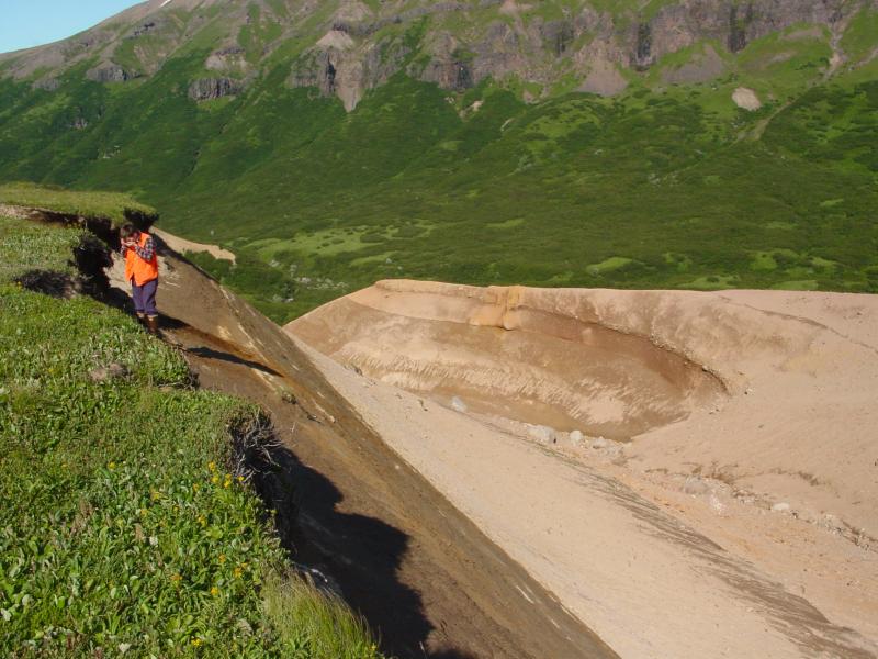 AVO geologist Tina Neal gets a closer look at the ~4,600 year old pyroclastic flow deposite from Black Peak on the Alaska Peninsula.