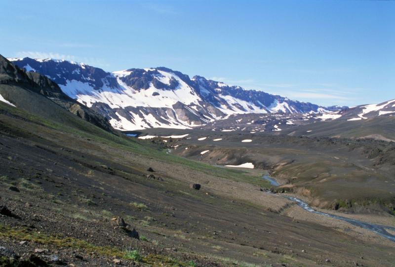 Aniakchak caldera. View from 1930 Father Hubbard photo site, immediately south of The Gates, 20-30 meters up slope above tributary stream, toward covered glacier located between Vent Mountain and south caldera wall. 