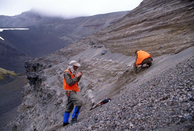 Geologists examining deposits. Location is west wall of 1931 crater. Aniakchak caldera.