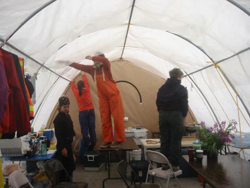 During the first strong storm day at our camp, condensation on the interior of the weatherport required installation of a visquine barrier to catch the drips.