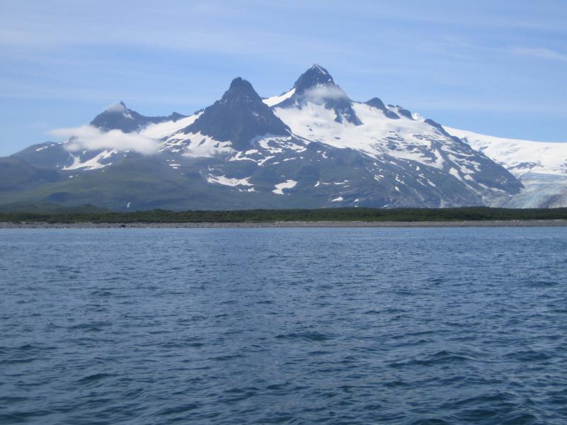 Fourpeaked Volcano - taken from ship offshore of Cape Douglas in Katmai National Park, Alaska Paninsula. A small part of the Fourpeaked Glacier is visible to the north (right on image).