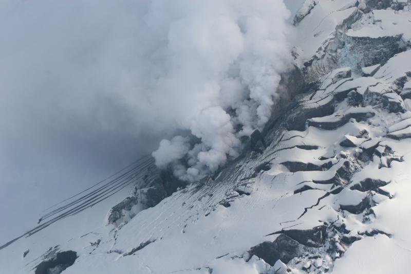 Summit craters on the north facing edifice of Fourpeaked volcano. View is looking from west to east.