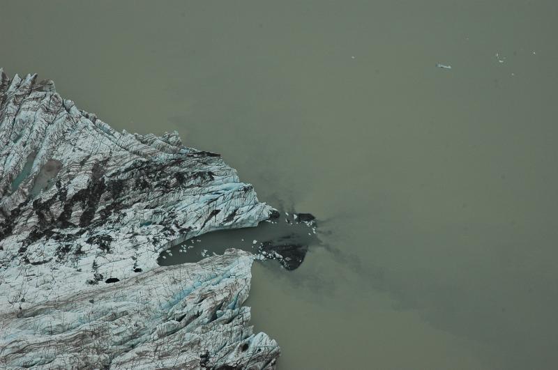 View of toe of Fourpeaked Glacier terminating into a large proglacial lake. Deposits out front of the subglacial tunnel were not seen on the 9/20/06 overflight.
