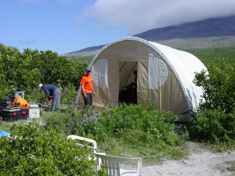 Augustine Field work, August, 2006. Kitchen tent is up! Ben Pauk and Ally Marzulla (UNAVCO/PBO) organising gear.