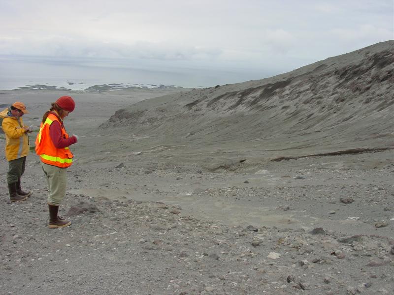 Augustine Field work, August, 2006. Dr.s Michelle Coombs (AVO-USGS) and Jim Beget (AVO-UAF) taking notes on "Windy" CBpf. 1883 lava flow on right.