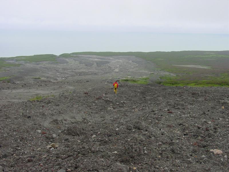 Augustine Field work, August, 2006. Dr. Jim Beget (AVO-UAF) on mixed avalanche debris, Augustine Creek.