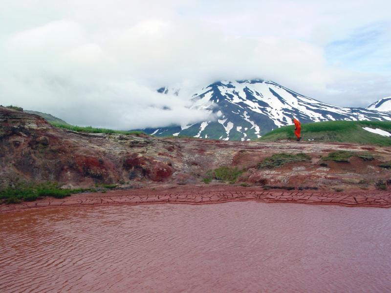 One of the several large, active thermal pools located southwest of Korovin and west-northwest of Kluichef on northern Atka Island.  Korovin is in the background of this photo.  This thermal area is known informally as Red Pool.  Coordinates: 
52 20.878' N   174 14.767' W