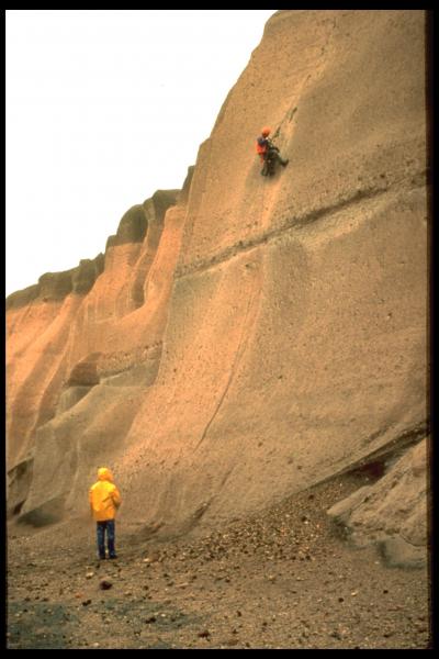 Game McGimsey collecting samples from the ash flow sheet in the Valley of Ten Thousand Smokes, Katmai.
