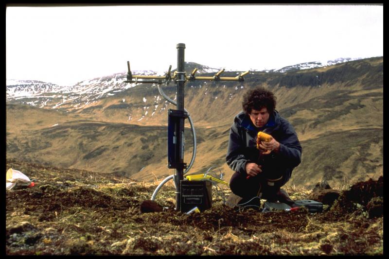 John Power testing a temporary seismic station at Akutan.  