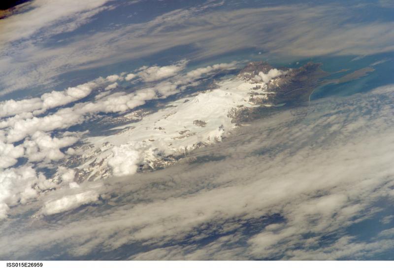 Mount Douglas and Fourpeaked volcano, on the far eastern edge of the Alaska Peninsula, as viewed from space.
This photograph is mission ISS015, Roll E, Frame 26959 from Image Science and Analysis Laboratory, NASA-Johnson Space Center. "The Gateway to Astronaut Photography of Earth." and is available at http://eol.jsc.nasa.gov/scripts/sseop/photo.pl?mission=ISS015&roll=E&frame=26959