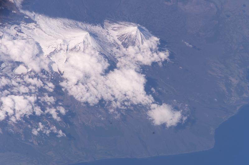 From left (west) to right (east): Hague, Little Pavlof, Pavlof, and Pavlof sister volcanoes, as viewed from space. This photograph is mission ISS011, Roll E, Frame 13575 from Image Science and Analysis Laboratory, NASA-Johnson Space Center. "The Gateway to Astronaut Photography of Earth." and is available at http://eol.jsc.nasa.gov/scripts/sseop/photo.pl?mission=ISS011&roll=E&frame=13575