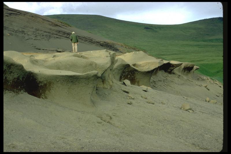 Bob Smith standing on Fisher ash flows, Bering Sea