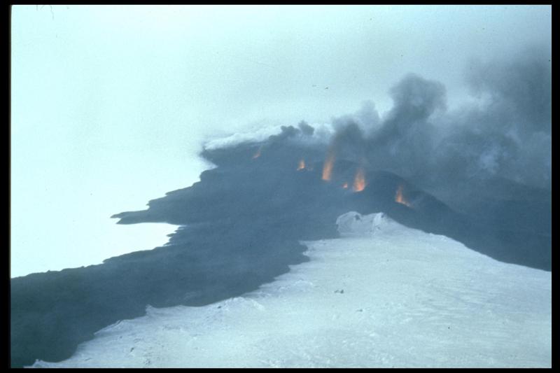 Seguam/Pyre Peak in eruption in 1977. Lava fountaining from basaltic fissure eruptions such as these is fairly rare in the Aleutians. 