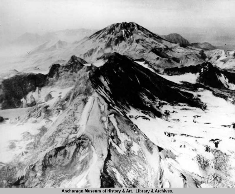 In the foreground is the southeast wall of Mt. Katmai's crater wall.  The peak of Mt. Griggs (formerly Knife Peak) is in the background.  Original photograph size in 8 1/8"x10".