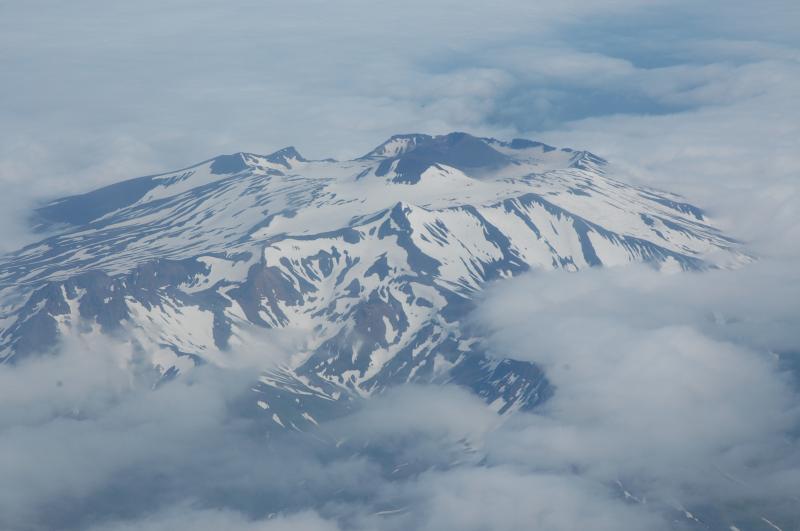 Akutan, as viewed on 7/21/2008, with clean snow. Aerial overflight courtesy of Air Station Kodiak, US Coast Guard.