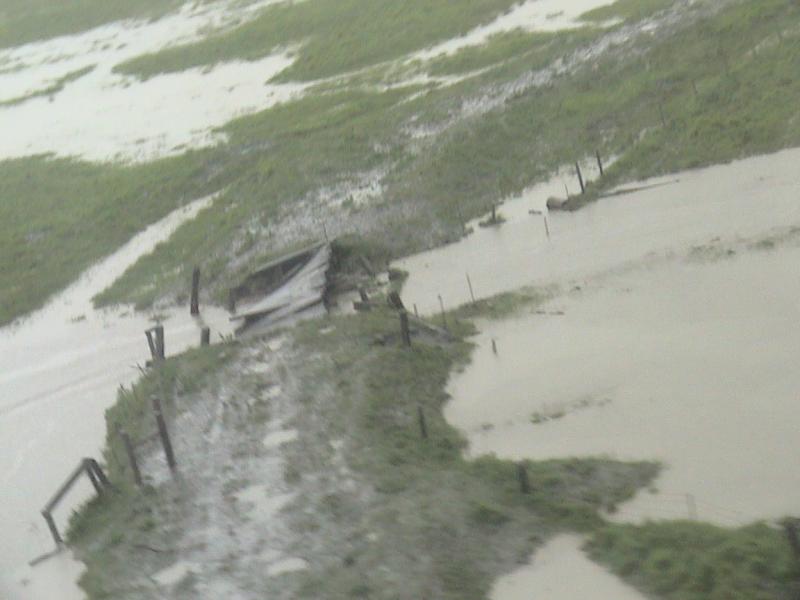Aerial view of a lahar-damaged bridge near Ft. Glenn, Umnak Island.