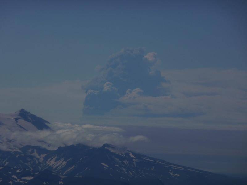 Aerial view of Okmok eruption. Photograph taken by Shawn Dahle, National Oceanic and Atmospheric Administration, National Marine Mammal Lab.