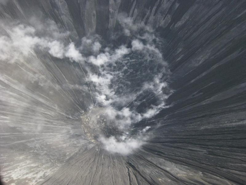 A view down into the steaming crater of the new cinder cone formed during the 2008 eruption of Okmok volcano. 