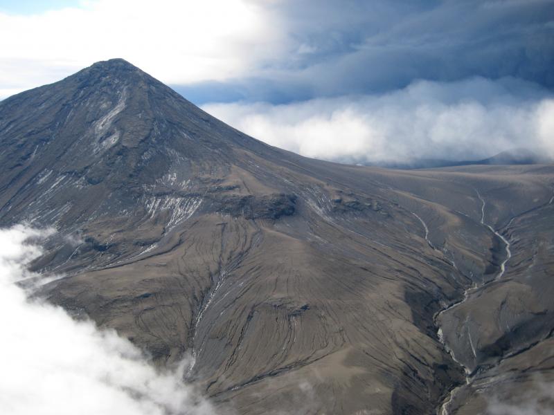 Mt. Tulik, a flank vent on the southeastern flanks of Okmok volcano. This photo shows ash from the 2008 eruption coating the caldera rim and the eastern flanks of Mt Tulik.