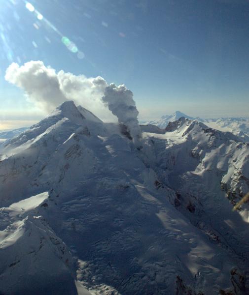 Looking south at the north flank of Redoubt volcano. Ashfall limited to south crater floor, rim, and extending south-southeast.  Source of ash is a vent south of the 1990 dome at an elevation of ~8300 ft.   	