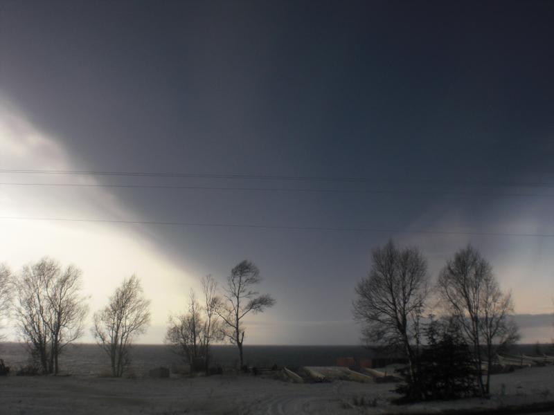 				Photograph of Redoubt's ash cloud, viewed while traveling between Kenai and Nikiski. Photograph courtesy of Jaden Larson.