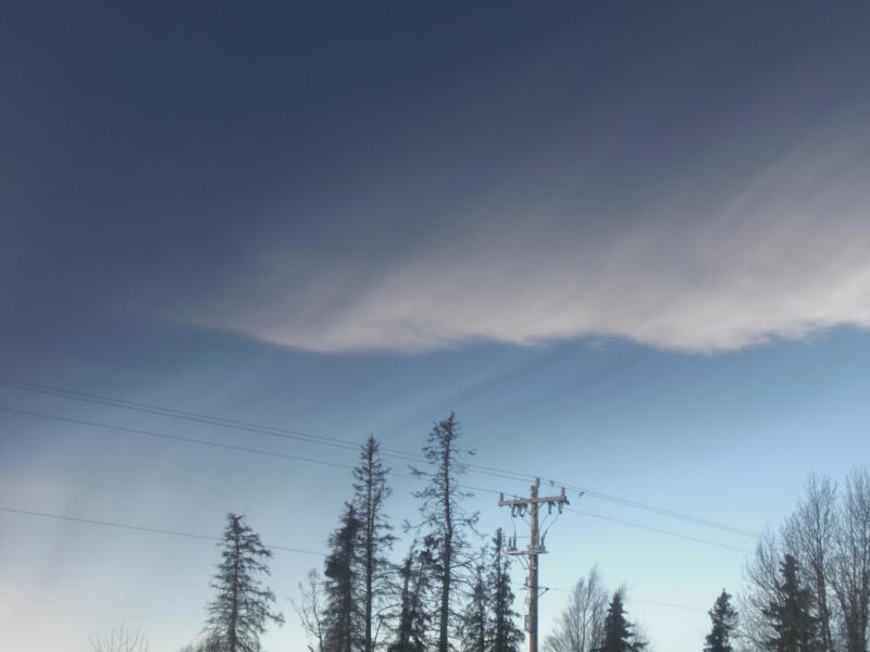 								Photograph of Redoubt's ash cloud, viewed while traveling between Kenai and Nilnilchik. Photograph courtesy of Jaden Larson.