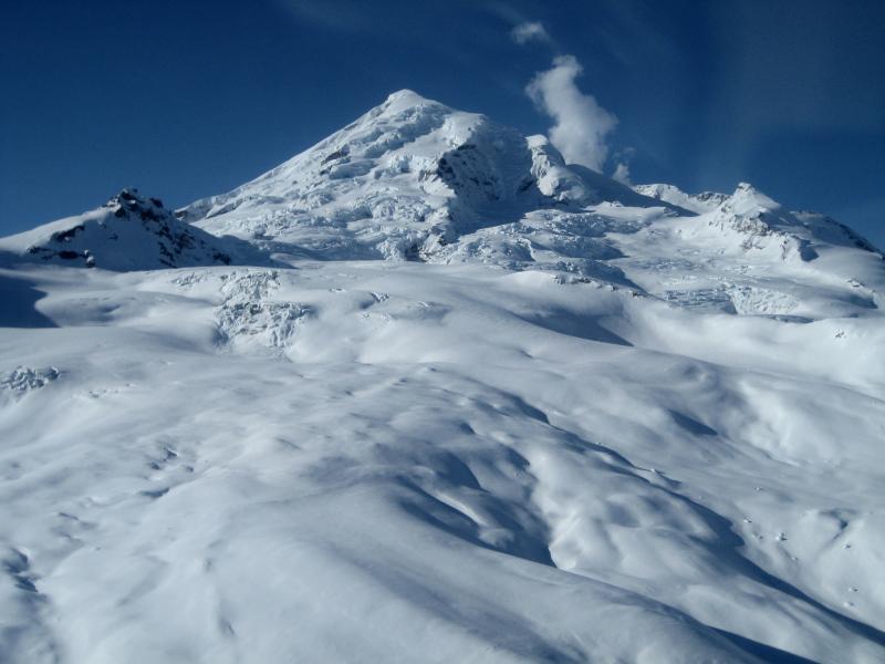 Glaciated NE slopes of Redoubt Volcano. Small steam plume rises from summit crater.  Pre-eruption images from GPS fieldwork day, March 18th 2009.