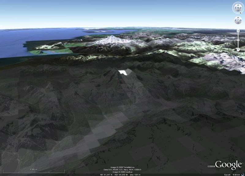 AVHRR image from the morning of April 5.  The view has a zenith angle of 3, so straight down on to the volcano.  The warm areas are white, the cold black.  The thermal activity seems to be primarily at the summit, and the warm water/lahars/block and ash flows have warmed the Drift River drainage about 10 degrees C above the background temperature.