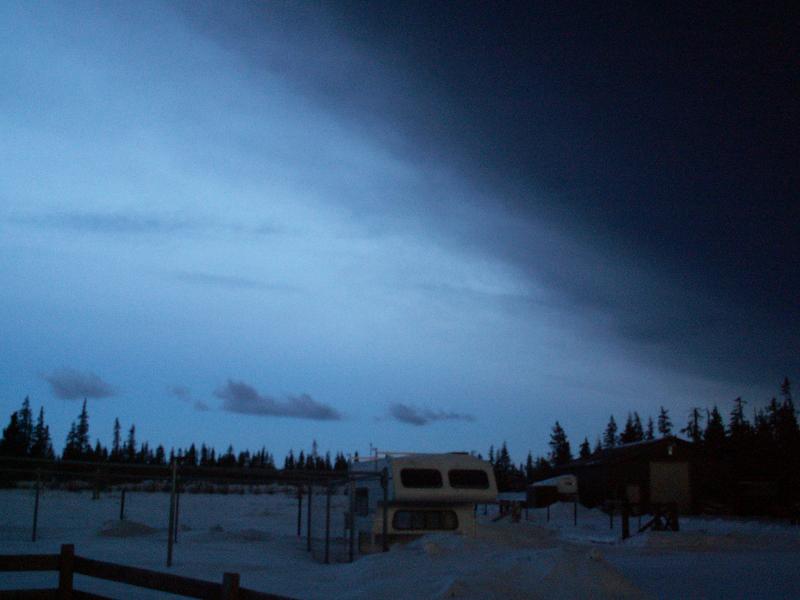 Ashfall and ash cloud from Redoubt, on the morning of April 4, 2009, as seen from Anchor Point. Photograph courtesy of Nancy and Randy Schmoker.	