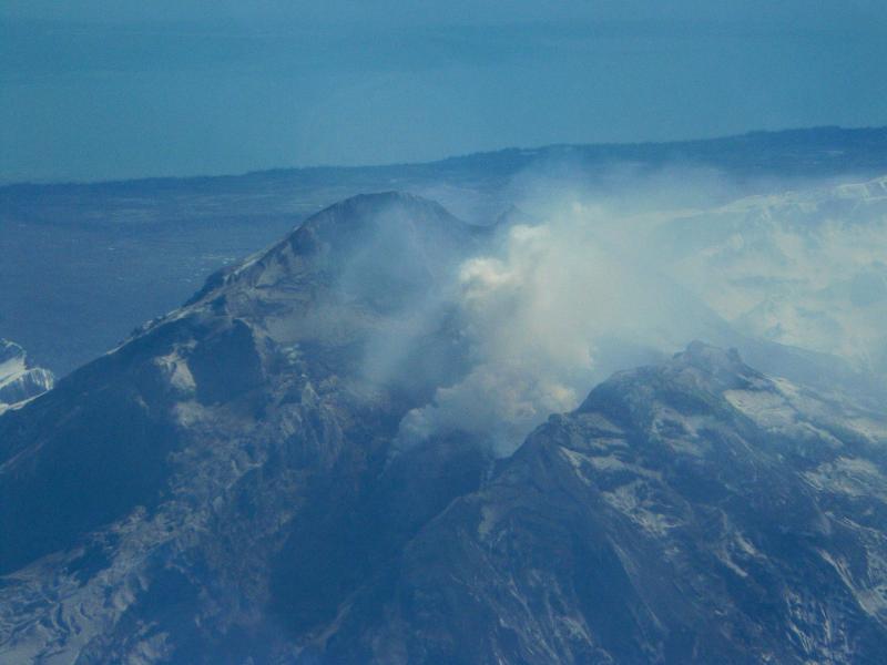 Redoubt Volcano, taken by FedEx pilot Robert Allen. The photo was from an altitude of ~17000 feet and about 25 miles north, on the entry track from Asia. 