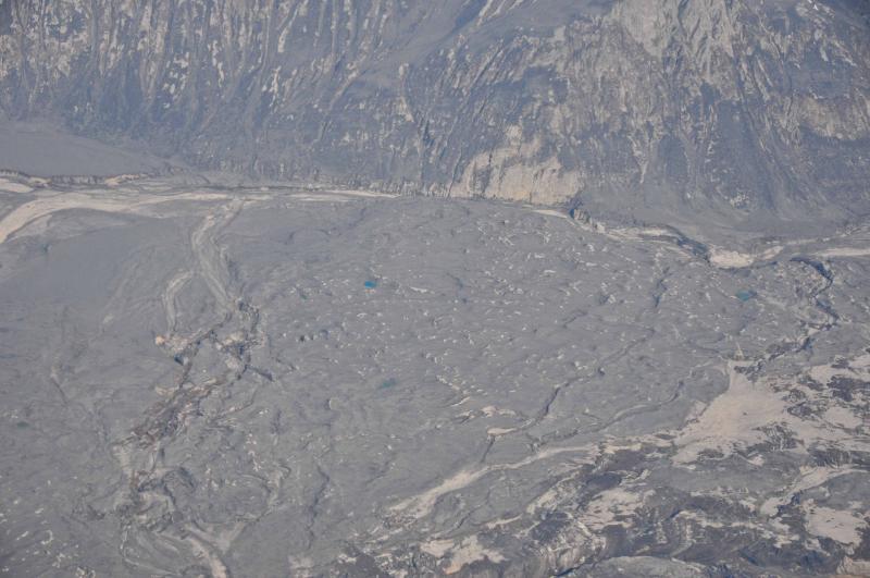 Ash covered surface of Drift glacier piedmont lobe. View is toward the north.