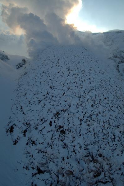 Redoubt's 2009 lava dome, with snow.			